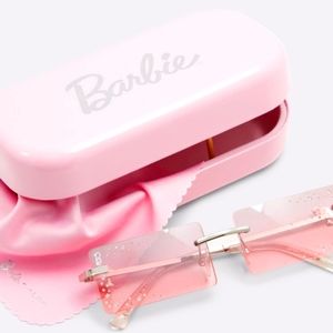 Barbie Sunglasses by Aldo. Pink with logo, silhouette charm.